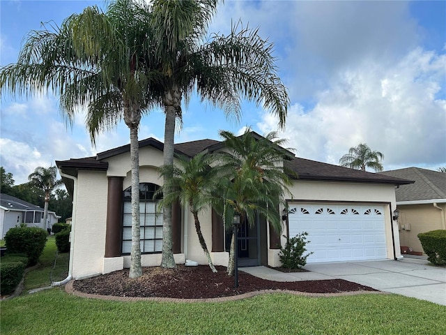 11520 Lounds Ct, New Port Richey, FL 34654 - ranch-style house with stucco siding, concrete driveway, and an attached garage