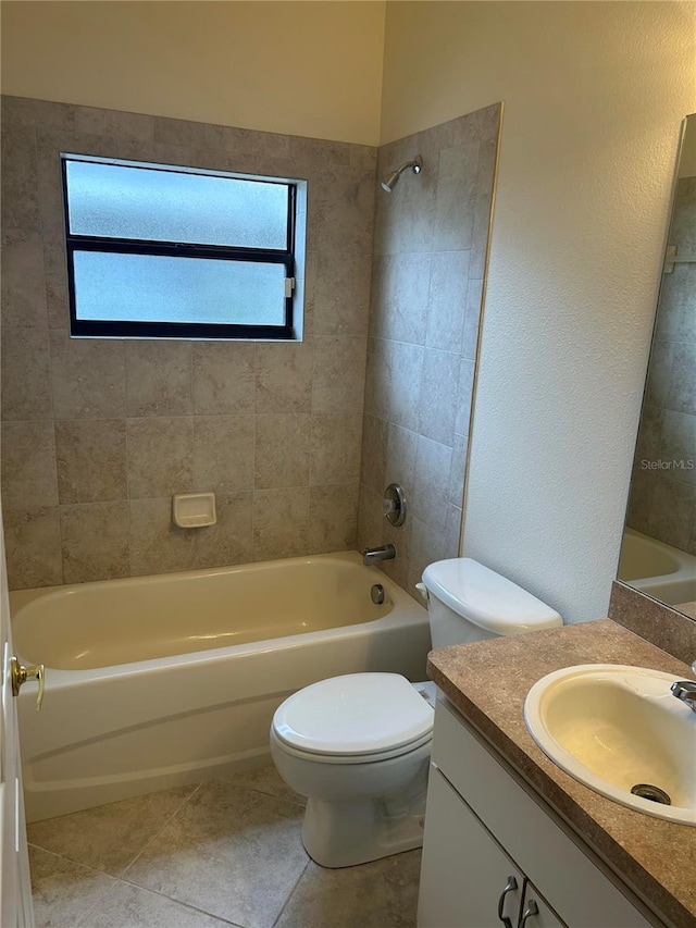 11520 Lounds Ct, New Port Richey, FL 34654 - bathroom with vanity, shower / bathtub combination, toilet, and tile patterned flooring