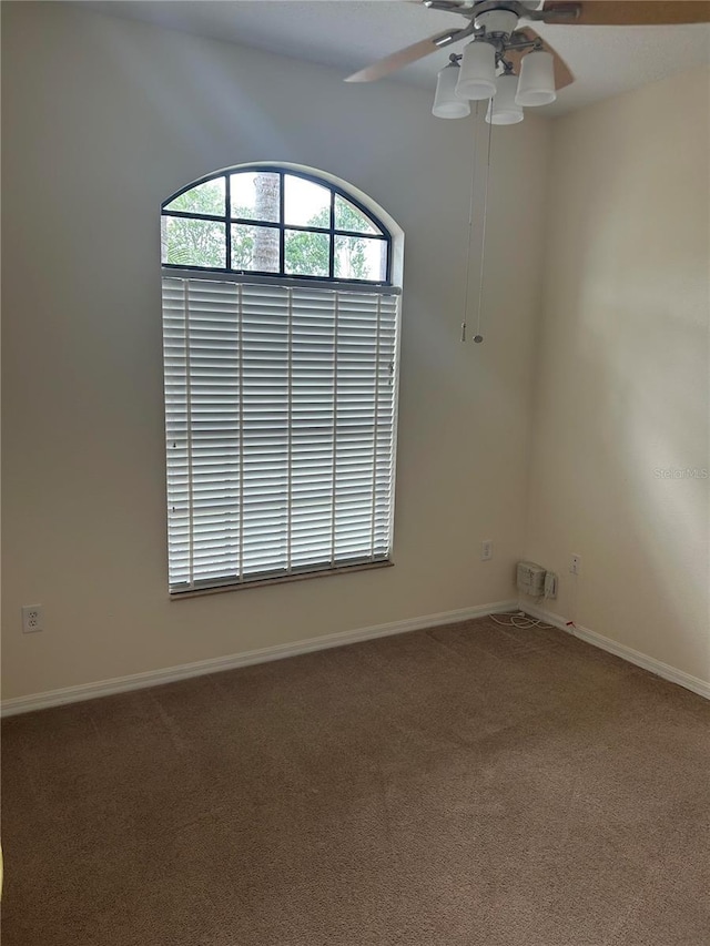 11520 Lounds Ct, New Port Richey, FL 34654 - carpeted empty room featuring ceiling fan and baseboards
