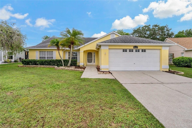 4125 Mc Clung Dr, New Port Richey, FL 34653 - ranch-style home with driveway, stucco siding, an attached garage, and a front lawn