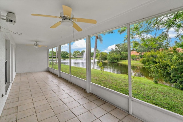 4125 Mc Clung Dr, New Port Richey, FL 34653 - unfurnished sunroom featuring ceiling fan and a water view