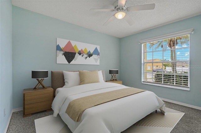 4125 Mc Clung Dr, New Port Richey, FL 34653 - bedroom with baseboards, carpet, a textured ceiling, and ceiling fan