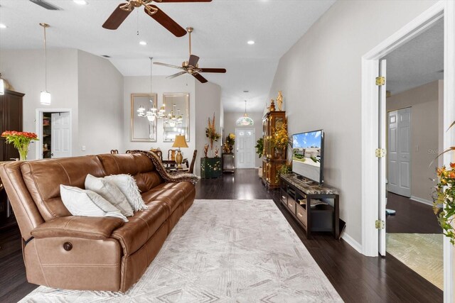 1142 Wolford Dr, Trinity, FL 34655 - living area with a ceiling fan, dark wood-type flooring, vaulted ceiling, recessed lighting, and baseboards
