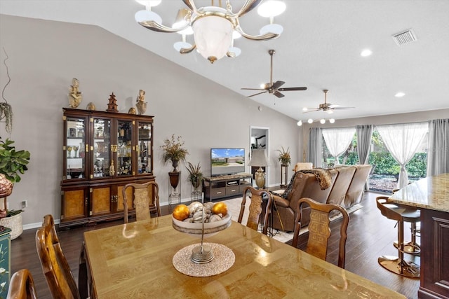 1142 Wolford Dr, Trinity, FL 34655 - dining room with a chandelier, vaulted ceiling, dark wood-style floors, recessed lighting, and baseboards