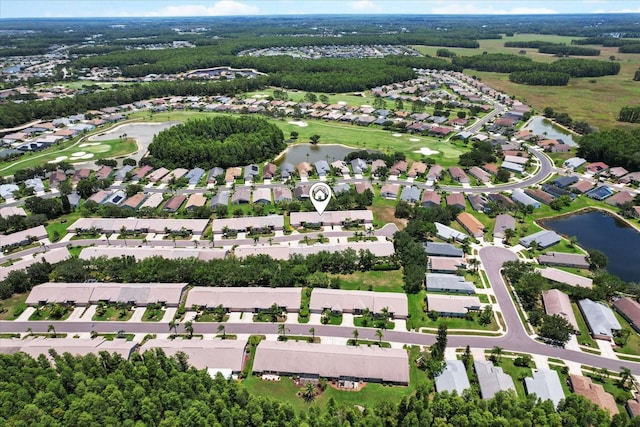 1142 Wolford Dr, Trinity, FL 34655 - aerial view of property and surrounding area featuring a nearby body of water, nearby suburban area, and a golf course