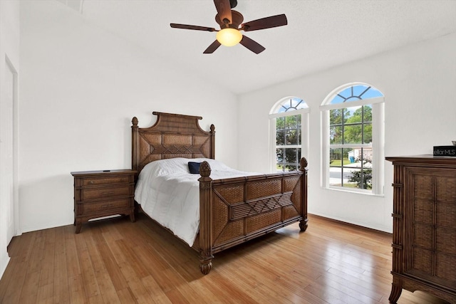 2172 Whitewood Ave, Spring Hill, FL 34609 - bedroom with hardwood / wood-style floors, vaulted ceiling, and a ceiling fan