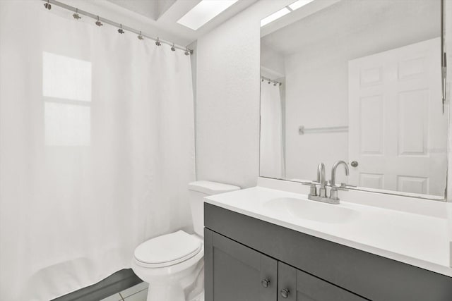 2172 Whitewood Ave, Spring Hill, FL 34609 - full bath featuring vanity, toilet, a shower with shower curtain, and tile patterned flooring