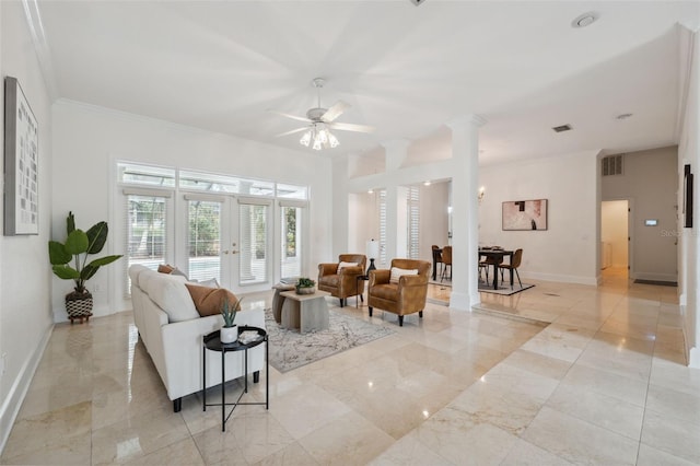1471 N Jasmine Ave, Tarpon Springs, FL 34689 - living area featuring ceiling fan, ornamental molding, french doors, ornate columns, and baseboards
