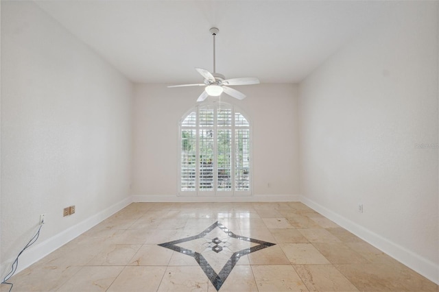 1471 N Jasmine Ave, Tarpon Springs, FL 34689 - unfurnished room featuring ceiling fan, baseboards, and inlaid floor details