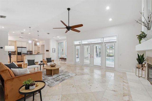 1471 N Jasmine Ave, Tarpon Springs, FL 34689 - living area with a ceiling fan, recessed lighting, french doors, and baseboards