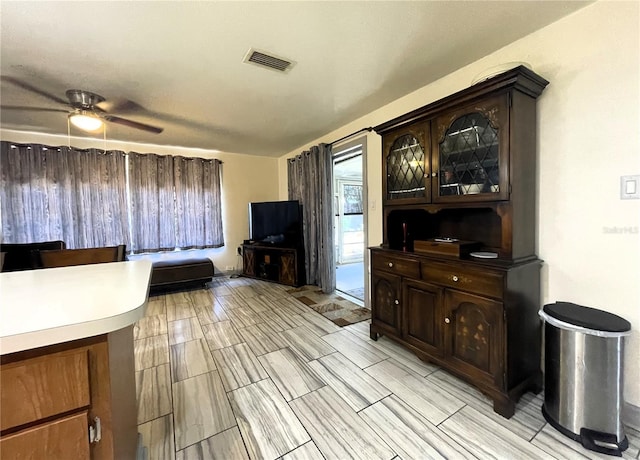 7534 Briarwood Dr, Port Richey, FL 34668 - living room featuring ceiling fan
