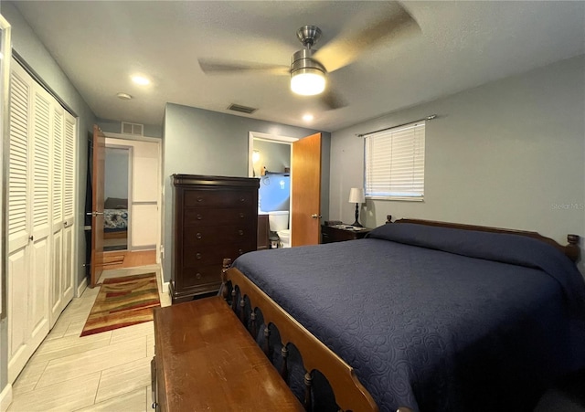 7534 Briarwood Dr, Port Richey, FL 34668 - bedroom featuring ceiling fan, connected bathroom, and a closet