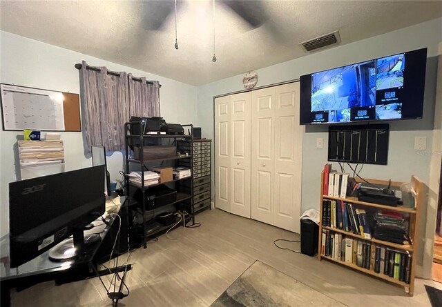 7534 Briarwood Dr, Port Richey, FL 34668 - office area featuring wood finished floors