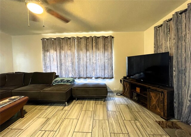 7534 Briarwood Dr, Port Richey, FL 34668 - living area featuring ceiling fan and wood tiled floors