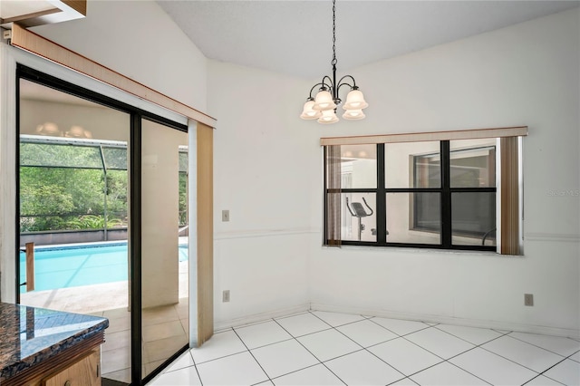 128 Oak Lake Dr, Spring Hill, FL 34608 - unfurnished dining area featuring a chandelier and baseboards