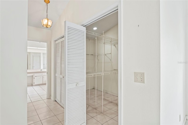 128 Oak Lake Dr, Spring Hill, FL 34608 - corridor with light tile patterned floors