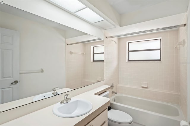 128 Oak Lake Dr, Spring Hill, FL 34608 - full bathroom featuring toilet, vanity, and shower / bathtub combination