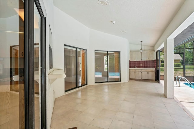 128 Oak Lake Dr, Spring Hill, FL 34608 - view of patio / terrace featuring an outdoor kitchen and a lanai
