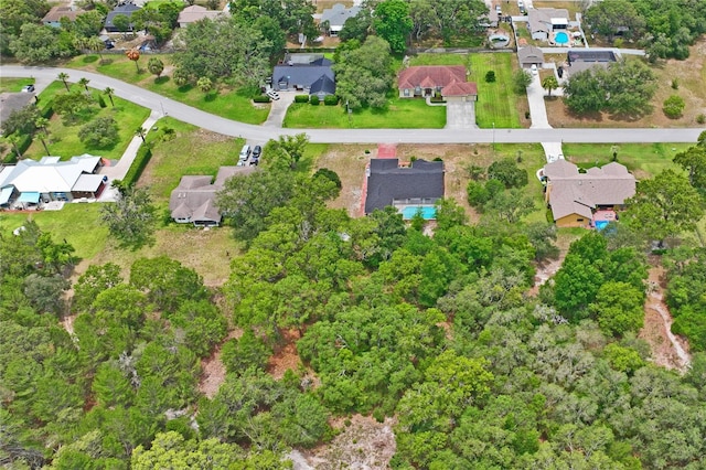 128 Oak Lake Dr, Spring Hill, FL 34608 - aerial overview of property's location featuring nearby suburban area
