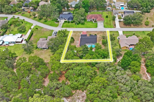 128 Oak Lake Dr, Spring Hill, FL 34608 - view of property location featuring property boundaries highlighted and nearby suburban area