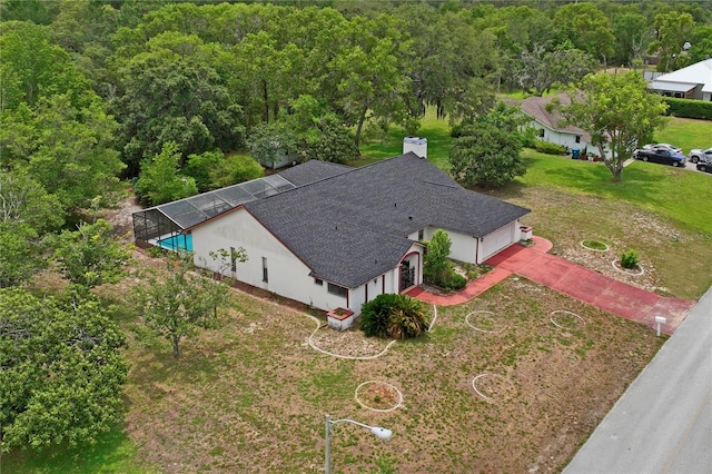 128 Oak Lake Dr, Spring Hill, FL 34608 - view from above of property with a heavily wooded area