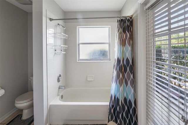 22316 Red Jacket Ln, Land O Lakes, FL 34639 - bathroom with toilet and shower / tub combo with curtain