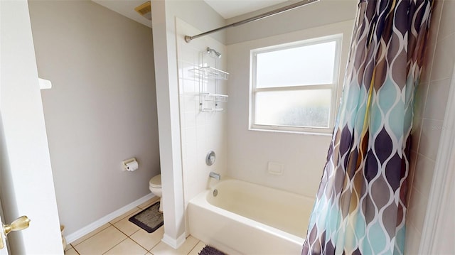 22316 Red Jacket Ln, Land O Lakes, FL 34639 - bathroom with toilet, tile patterned flooring, shower / bath combo, and baseboards