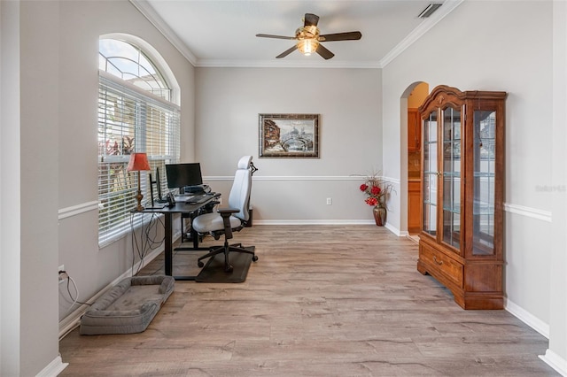 22316 Red Jacket Ln, Land O Lakes, FL 34639 - office with ceiling fan, healthy amount of natural light, ornamental molding, arched walkways, and light wood-type flooring