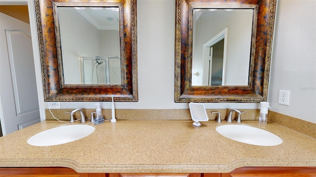 22316 Red Jacket Ln, Land O Lakes, FL 34639 - bathroom with double vanity, an enclosed shower, and ornamental molding