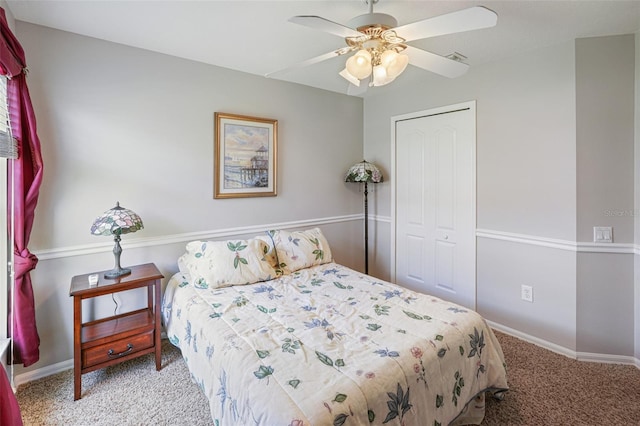 22316 Red Jacket Ln, Land O Lakes, FL 34639 - bedroom featuring carpet floors, a closet, baseboards, and a ceiling fan