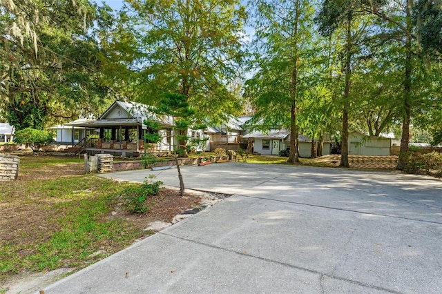 10844 W Yulee Dr, Homosassa, FL 34448 - view of front of home featuring driveway and covered porch