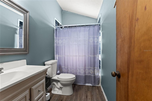 10844 W Yulee Dr, Homosassa, FL 34448 - full bath featuring vanity, vaulted ceiling, wood finished floors, and curtained shower
