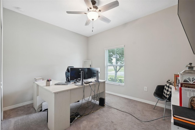 12313 Criollo Rd, Spring Hill, FL 34610 - office area with light colored carpet, ceiling fan, and baseboards
