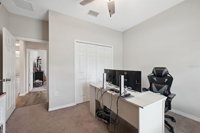 12313 Criollo Rd, Spring Hill, FL 34610 - carpeted home office with baseboards and ceiling fan