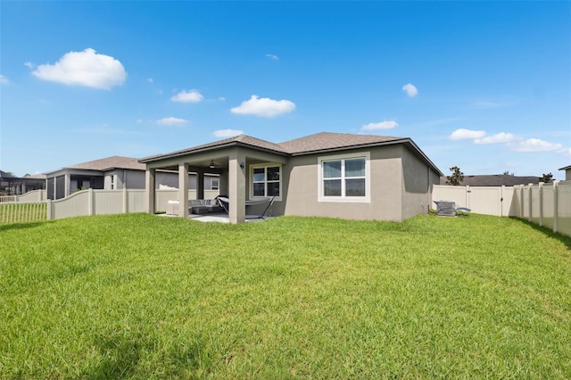 12313 Criollo Rd, Spring Hill, FL 34610 - back of house featuring stucco siding, a patio area, and an outdoor living space
