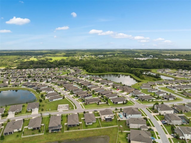 12313 Criollo Rd, Spring Hill, FL 34610 - aerial view of property's location featuring a nearby body of water and nearby suburban area