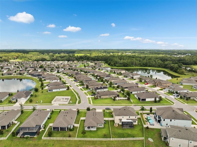 12313 Criollo Rd, Spring Hill, FL 34610 - aerial perspective of suburban area with a nearby body of water