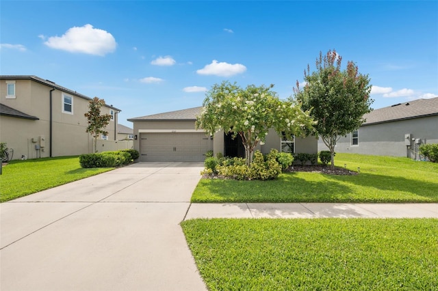 12313 Criollo Rd, Spring Hill, FL 34610 - view of front of home featuring an attached garage, concrete driveway, a front lawn, and stucco siding