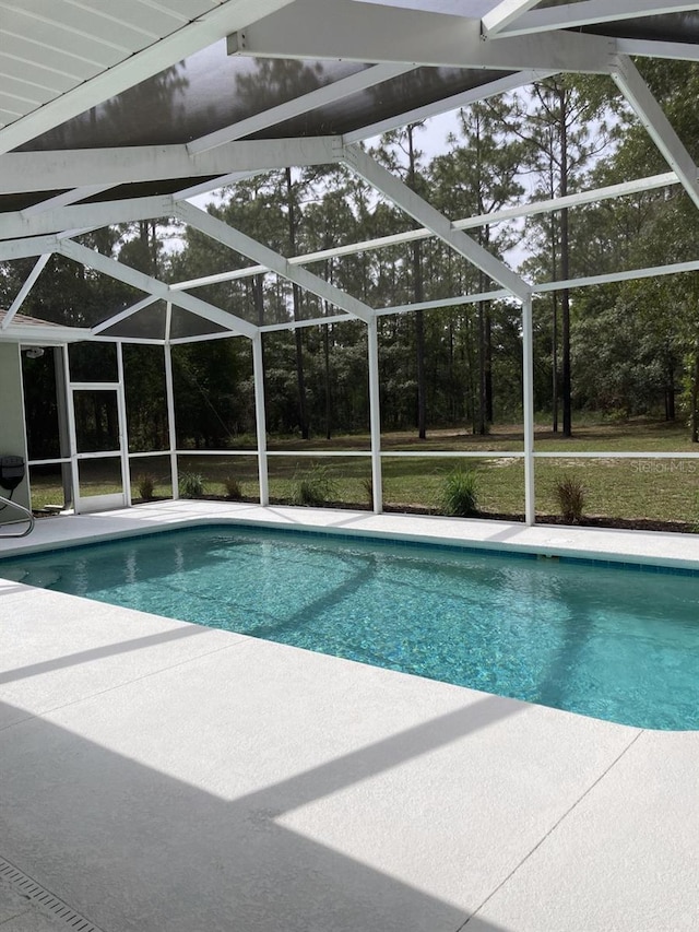 2543 E Marcia St, Inverness, FL 34453 - swimming pool featuring a lanai and a patio area