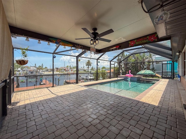 6601 Nautical Isle, Hudson, FL 34667 - swimming pool with a water view, a patio, glass enclosure, and a boat dock