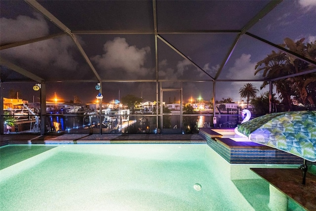 6601 Nautical Isle, Hudson, FL 34667 - pool at night with a water view