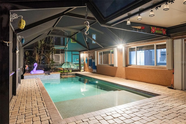 6601 Nautical Isle, Hudson, FL 34667 - swimming pool with a patio and glass enclosure