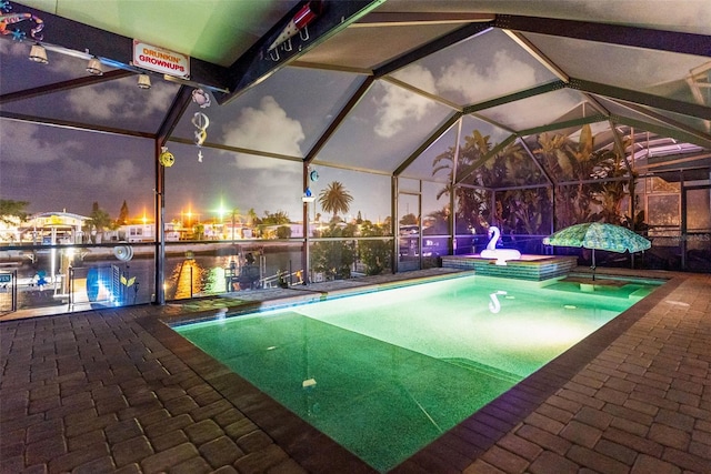 6601 Nautical Isle, Hudson, FL 34667 - swimming pool with glass enclosure, a patio area, and a jacuzzi
