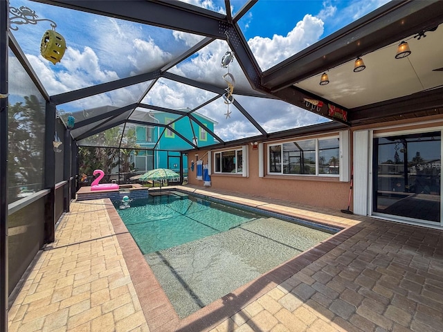 6601 Nautical Isle, Hudson, FL 34667 - view of swimming pool with a patio area, a pool with connected hot tub, and a lanai