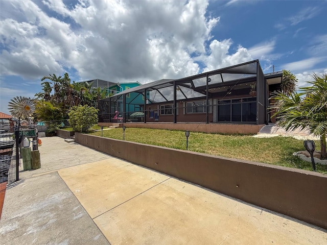 6601 Nautical Isle, Hudson, FL 34667 - view of patio / terrace featuring a lanai