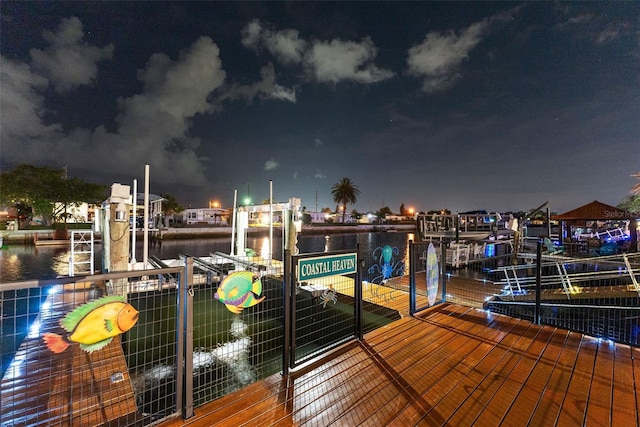 6601 Nautical Isle, Hudson, FL 34667 - dock featuring boat lift and a water view