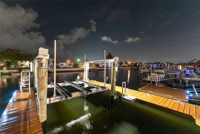 6601 Nautical Isle, Hudson, FL 34667 - dock area featuring boat lift and a water view