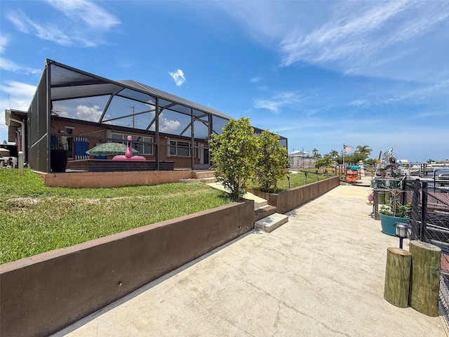 6601 Nautical Isle, Hudson, FL 34667 - view of patio / terrace with glass enclosure