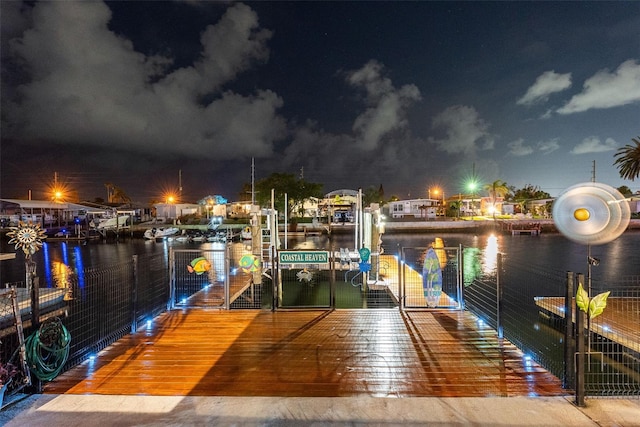 6601 Nautical Isle, Hudson, FL 34667 - dock featuring boat lift and a water view