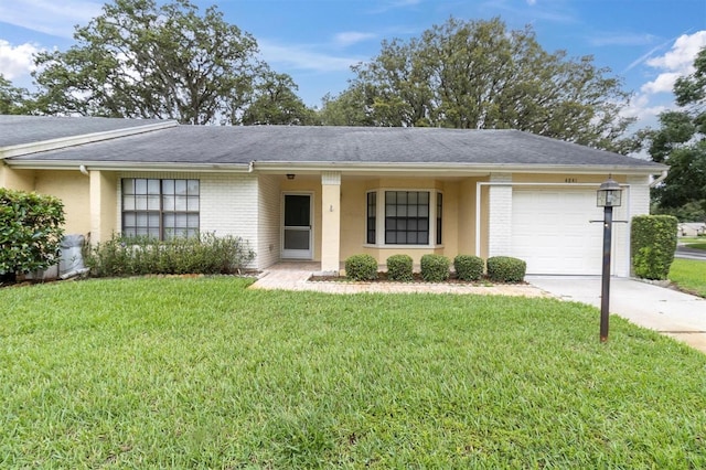 4841 Wakefield Ct Unit 4841, New Port Richey, FL 34655 - ranch-style home with a garage, concrete driveway, a front lawn, and stucco siding
